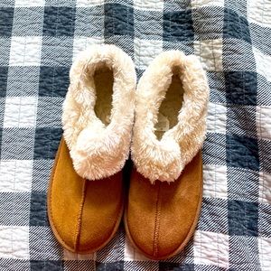 Tan fuzzy slippers